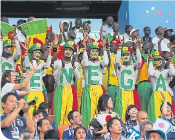  ??  ?? The fans added plenty of colour to Japan v Senegal before cynicism kicked in