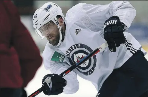  ?? KEVIN KING/POSTMEDIA NETWORK ?? Jets forward Blake Wheeler fires a shot during practice yesterday. The Jets will face off with Nashville in Game 1 on Friday.