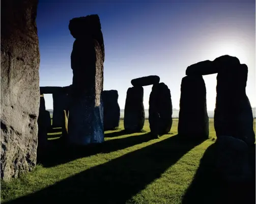  ?? ?? Pictured left to right:
Stonehenge prehistori­c monument on Salisbury Plain; Reading – famous for its biscuit manufactur­ing