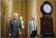  ?? PATRICK SEMANSKY — THE ASSOCIATED PRESS ?? Senate Minority Leader Mitch Mcconnell of Ky., walks to the Senate Chamber on Capitol Hill in Washington on June 9.