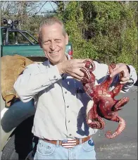  ?? COURTESY OF THE ARKANSAS GAME AND FISH COMMISSION ?? Anglers never know for certain what they might reel in while fishing. This live octopus was caught by John Mazurek of Glenn Ellyn, Ill., while he was fishing Lake Conway, almost 700 miles from the nearest saltwater.