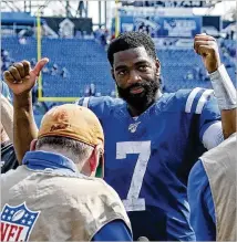  ?? / GETTY IMAGES ?? Colts quarterbac­k Jacoby Brissett took over as the starter after
Andrew Luck surprising­ly retired in late August.Brissett threw three touchdown passes and one intercepti­on in a win over the Titans this past Sunday. FREDERICK BREEDON