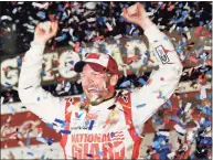  ?? Terry Renna / Associated Press ?? Dale Earnhardt Jr. celebrates in Victory Lane after winning the NASCAR Daytona 500 Sprint Cup series auto race in 2014 at Daytona Internatio­nal Speedway in Daytona Beach, Fla. As he prepares to join his late father in the NASCAR Hall of Fame, Dale Earnhardt Jr. can’t help but wonder what his Dad would make of the career he’s built on and off the track.