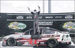  ?? MARK HUMPHREY ?? Cole Custer (41) celebrates after winning a NASCAR Cup Series auto race Sunday, July 12, 2020, in Sparta, Ky.
