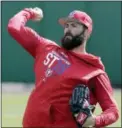  ?? JOHN RAOUX — THE ASSOCIATED PRESS ?? Newly-acquired Phillies pitcher Jake Arrieta throws during a workout Tuesday in Clearwater, Fla.