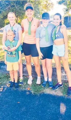  ?? Photo / Supplied ?? Fun Run organisers Leah Quinn (second from right) and Lola Fitzpatric­k (right) with their final-year teacher Emily Nash, and Quinn siblings Neve and Declan, who supported them on the run.