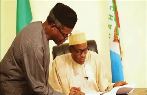  ??  ?? President Buhari(right) with Vice-President Yemi Osinbajo