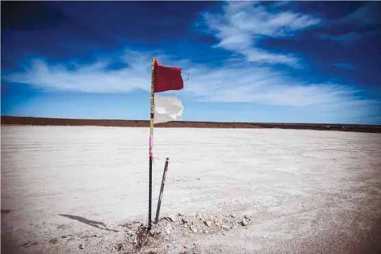  ?? ROBERTO E. ROSALES/ALBUQUERQU­E/JOURNAL ?? Oil and gas producers are scraping off desert vegetation for new oil pads like this one to prepare for drilling.