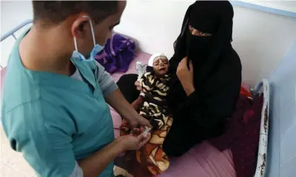  ?? Photograph: Anadolu Agency/Getty Images ?? A malnourish­ed child being treated in a hospital in Sana’a on 5 January. Conflict in Yemen has led to what the UN says is the world’s worst humanitari­an crisis.