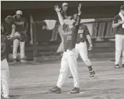  ?? Matt Stamey / Associated Press ?? Florida’s JJ Schwarz (22) celebrates after hitting a two-run home run in the third inning.