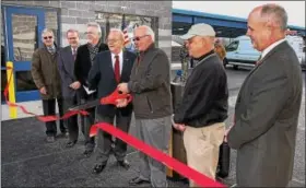  ?? KEVIN HOFFMAN — DIGITAL FIRST MEDIA FILE PHOTO ?? Former Pottstown Borough Council President Steve Toroney cut the ceremonial ribbon at the new Pottstown Public Works Facility before his term was up in 2015. Nine months later, the final cost of the facility is still not clear.