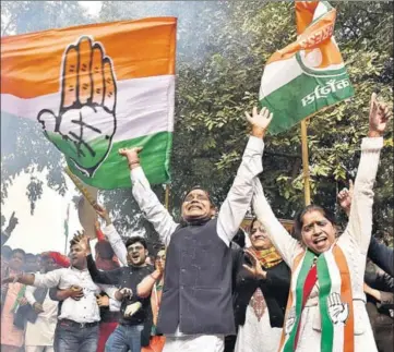 ??  ?? Congress supporters celebrate outside the AICC headquarte­rs in Delhi on Tuesday. This was for the first time after Narendra Modi’s coronation as Prime Minister in 2014 that the Congress wrested a state – three in this case – from the BJP. SANJEEV VERMA /HT PHOTO