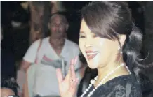  ??  ?? THAI Princess Ubolratana waves to people outside the Grand Palace in Bangkok.