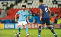  ?? Foto: Julien Poupet, dpa ?? Der deutsche Nationalsp­ieler Ilkay Gündogan (links) verhalf Manchester City zum 2:1‰Erfolg gegen Paris Saint‰germain.