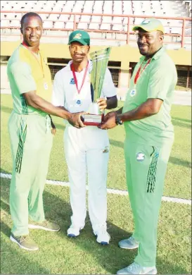  ??  ?? Winning trio: Manager/Assistant coach Rayon Griffith, skipper Leon Johnson and Coach Esuan Crandon.