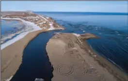  ?? File photo by James Mason ?? ONE YEAR AGO – A year ago the mouth of the Nome River was different than it is today. This photo was taken on May 16, 2019.