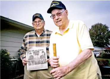  ?? STAFF PHOTO BY TROY STOLT ?? Veterans Taylor and John Creighton stand for a portrait in October in Hixson.