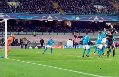  ?? AP ?? Manchester City’s John Stones (top right) scores his side’s second goal during the Champions League match against Napoli. —