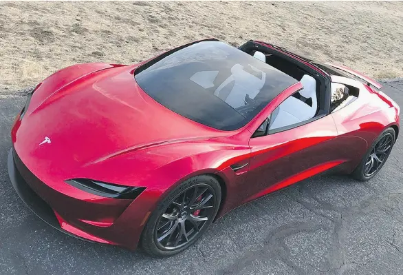  ?? ELON MUSK/TWITTER ?? Tesla is dominating the race with its US$200,000, all-wheel drive Roadster that goes 0-100 km/h in a mind-blowing 1.9 seconds, making it the fastest production car ever, says Barry Ritholtz. Supercar rivals like US$1.3-million McLaren P1 and the...