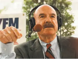  ?? Susan Walsh / Associated Press 1997 ?? Giddy broadcasts his syndicated radio talk show in 1997 from a hotel across from the Watergate Complex in Washington.