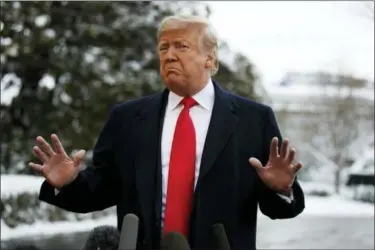  ?? EVAN VUCCI — THE ASSOCIATED PRESS ?? President Donald Trump talks with reporters on the South Lawn of the White House before departing for the American Farm Bureau Federation’s 100th Annual Convention in New Orleans, Monday in Washington.