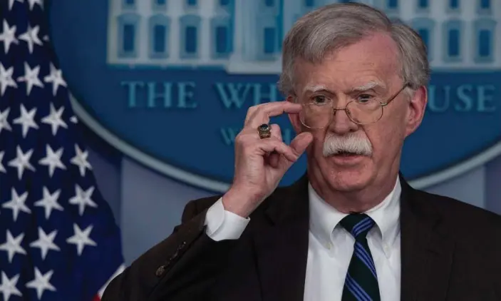  ??  ?? John Bolton at a press briefing at the White House on 27 November. Photograph: Nicholas Kamm/AFP/Getty Images