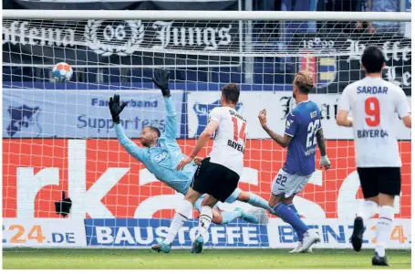  ?? GETTY IMAGES ?? Opening act: Patrik Schick of Bayer 04 Leverkusen scores the team's first goal during the Bundesliga match against TSG Hoffenheim at Prezero-arena in Sinsheim, Germany. Leverkusen secured a 4-2 victory.