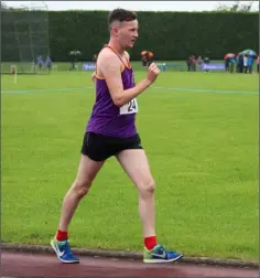  ??  ?? Joe Mooney (Wexford county) competing in the 3,000m walk.