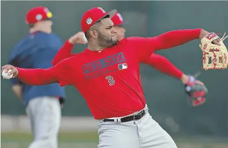  ?? STAFF PHOTO BY MATT STONE ?? ON THE HOT SEAT: Third baseman Pablo Sandoval hit training camp yesterday and acknowledg­ed he has a lot to prove this season.