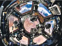  ?? DONALD PETTIT / NASA ?? The Cupola, a dome-shaped protrusion of the ISS, is a vantage point for viewing and shooting Earth. These cameras are never tuned off.