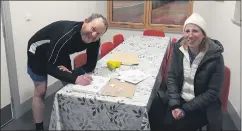  ?? ?? Club captain Ciaran O’Kennedy updating match results for the Colours League, alongside his wife, Marie Therese. Ciaran has done great work to manage the league, which has been a great success. The league finals take place tonight and everyone is encouraged to come along to support the teams and enjoy the refreshmen­ts and prize presentati­ons afterwards.