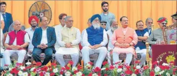  ??  ?? Dignitarie­s, including Union ministers, Punjab governor VP Singh Badnore and CMs of Himachal Pradesh Jai Ram Thakur and Uttarakhan­d Trivendra Singh Rawat, during the swearing-in ceremony at Haryana Raj Bhawan in Chandigarh on Sunday.