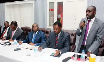  ??  ?? Zinara Board Chair and CEO Mr Albert Mugabe addresses members of Parliament and Matabelela­nd Rural District councillor­s at a Bulawayo Hotel yesterday. Listening (from left) are Minister Abednigo Ncube, Minister of Transport and Infrastruc­ture...