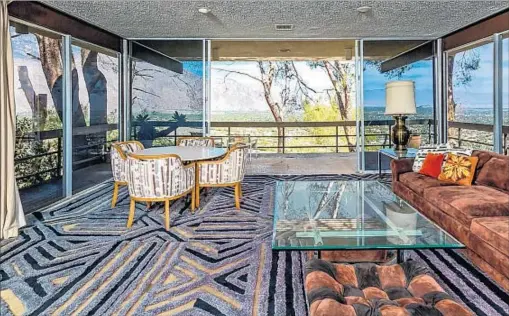  ?? Photograph­s courtesy of Coldwell Banker ?? STEVE MCQUEEN bought this Palm Springs home in the ’60s and lived there until he died, in 1980. The asking price is $2.5 million.