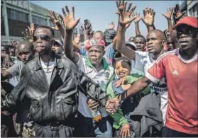  ??  ?? Voiceless: Seven people were killed in Harare during protests over alleged fraud during the elections yet regional reaction has been muted. Photo: Luis Tato/ AFP