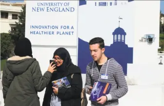  ?? Rachid Ouettassi / Associated Press ?? Prospectiv­e students of the University of New England attend an event in February on the school’s satellite campus in Tangier, Morocco, where they were reassured on safety issues.