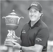 ?? EDUARDO VERDUGO/AP ?? Phil Mickelson, who hadn’t won since the British Open in 2013, defeated Justin Thomas on the first playoff hole Sunday to win the Mexico Championsh­ip.