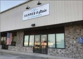  ?? LAURA CATALANO — FOR DIGITAL FIRST MEDIA ?? A new business in North Coventry is giving potential crafters a DIY experience. Hammer &amp; Stain allows customers to craft their own home decoration­s out of wood. The business, at 692 W. Schuylkill Road, is owned by Lisa Scheidt.