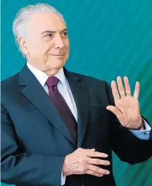  ?? CESAR ITIBERÊ/PR ?? Transição. Temer assinou MP com aval de Bolsonaro