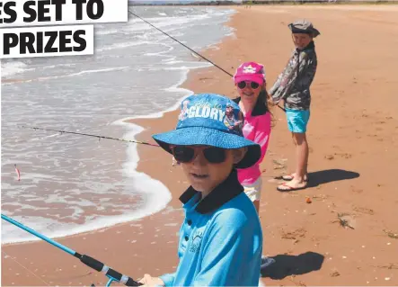  ??  ?? READY: Kieran, Madeline and Lachlan Slaven wet a line before the Townsville Family Fishing Challenge.