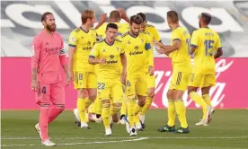  ??  ?? Sergio Ramos looks rueful after Anthony Lozano’s first-half strike gave Cádiz a 1-0 lead that they would retain. Photograph: Gonzalo Arroyo Moreno/Getty Images