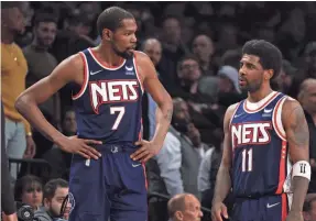  ?? AL BELLO, GETTY IMAGES ?? Kevin Durant and Kyrie Irving have played in just 57 games together for the Nets.