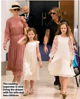  ??  ?? The country superstar is now living the dream with his wife and two children.