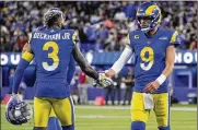  ?? AP ?? Los Angeles Rams wide receiver Odell Beckham Jr. (3) celebrates with quarterbac­k Matthew Stafford (9) during the first half of an NFL wild-card game Jan. 17.