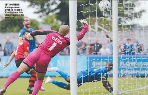  ?? PICTURES: Pro Sport Images ?? KEY MOMENT: Adebayo Azeez dives in to head Wimbledon’s late winner against the Grecians