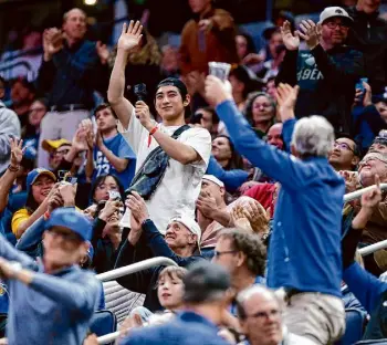  ?? Santiago Mejia/The Chronicle ?? Even in his brief time as a Giant, Jung Hoo Lee, seen being introduced at a Warriors game, has injected a much-needed spark of life into the club.