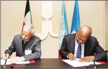  ?? KUNA photo ?? The agreement was signed by KFAED Deputy Chairman Hisham
Al-Wegayan and IFAD President Gilbert F. Houngbo.