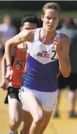  ?? Paul Chinn / The Chronicle ?? St. Joseph-Alameda’s Cooper Teare is the national leader at 3,200 meters.