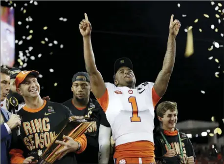  ?? DAVID J. PHILLIP — THE ASSOCIATED PRESS FILE ?? In this file photo, Clemson’s Trayvon Mullen celebrates after the NCAA college football playoff championsh­ip game against Alabama, in Santa Clara For the first time, the defending national champion Tigers are No. 1 in The Associated Press preseason Top 25 presented by Regions Bank, Monday.