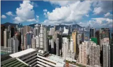 ?? CHO SEONG-JOON / BLOOMBERG ?? As Hong Kong’s property prices continue to go through the roof, residents have been left with little choice but to opt for smaller homes.